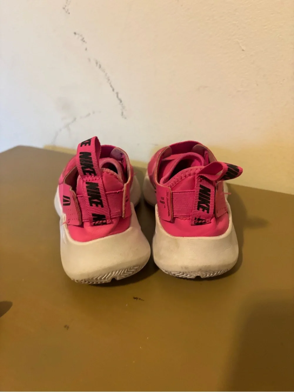 Nike Kids Slip-On Sneakers in Bright Pink